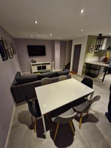 Entire house with arcade machine in a private backyard, 3 bedrooms, 1 bathroom, 1 leaving room with convertible sofa and open kitchen