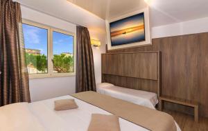 Triple Room with Beach Access room in Hotel Pineta Mare
