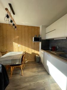 Appartements Studio cabine cosy a 5min a pieds des pistes et du centre ville : photos des chambres