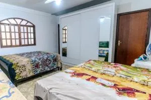 Quarto com 2 Camas de Casal Banheiro privado - Jucu