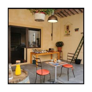 B&B / Chambres d'hotes Des Lits Sur La Place : photos des chambres