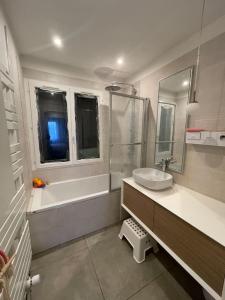 Appartements Le cocon du Parisis : photos des chambres