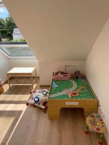 Appartements Le cocon du Parisis : photos des chambres
