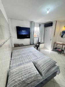 Ap próximo ao Arco com garagem e ar