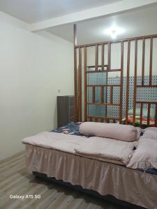 Widodaren Homestay twin bed