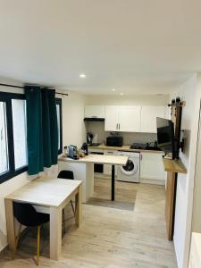 Appartements Charmant studio en centre-ville : photos des chambres