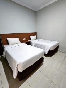 Phòng Hai Giường Đơn Loại Sang (Deluxe Twin Room)