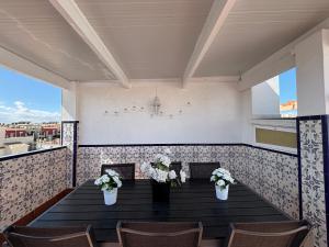 Holiday home with large roof terrace near La Mata beach