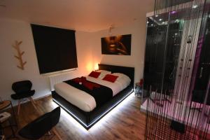 Appartements SPA privatif Love room, Le Hammam et Bulles, chez Nuits Chartraines : photos des chambres