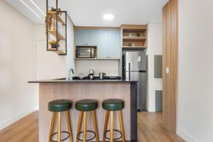 Conforto a 950m da Rua Coberta by Achei Gramado