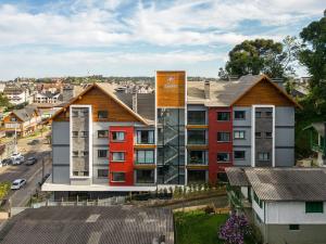 Conforto a 950m da Rua Coberta by Achei Gramado