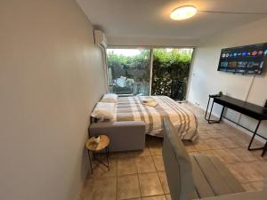 Studio Nîmois bien équipé avec parking