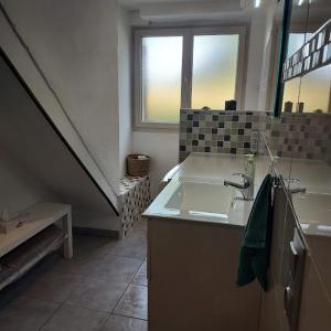 Appartements Au petit bois magique : photos des chambres