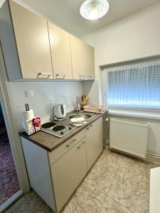 Nyugalom Szigete Apartmanok