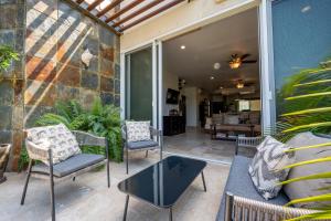 Spacious & Serene PENTHOUSE with Rooftop, Jungle Views, PRIME LOCATION Steps to Beach & 5th Ave