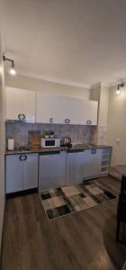 Ski in Ski out Tiamo Apartment 302-303 at Gudauri loft hotel