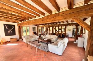 Maisons de vacances La Faisanderie a 5 min du Chateau de Chambord avec Grand Parc et Piscine : photos des chambres