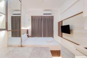 Nice Studio Apartment at Sky House BSD By Travelio