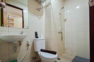 Tranquil Studio at Vida View Makassar Apartment By Travelio