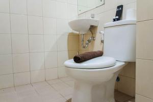 Tranquil Studio at Vida View Makassar Apartment By Travelio