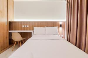 Comfy and Homey Studio at Sky House BSD Apartment By Travelio