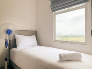 Homey and Simply 2BR at Serpong Garden Apartment By Travelio