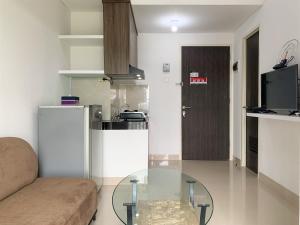 Homey and Simply 2BR at Serpong Garden Apartment By Travelio