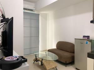 Homey and Simply 2BR at Serpong Garden Apartment By Travelio