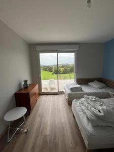 Maisons de vacances Gites de Landuzire, Sleeps 14 : photos des chambres
