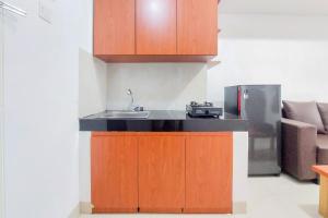 Warm and Minimalist 2BR at Serpong Garden Apartment By Travelio