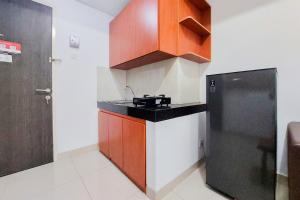 Warm and Minimalist 2BR at Serpong Garden Apartment By Travelio