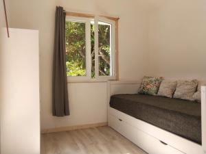 Maisons de vacances Maison Aloha Esprit Tiny house : photos des chambres