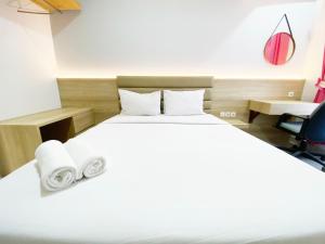 Homey and Modern Studio The Alton Apartment By Travelio