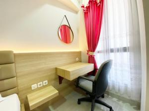 Homey and Modern Studio The Alton Apartment By Travelio