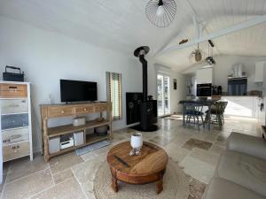 Maisons de vacances TI KAZ - Terrasse exterieure - 5mn Plage : photos des chambres