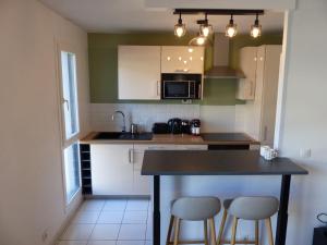 Appartements Appartement Saint Maurice avec parking : photos des chambres