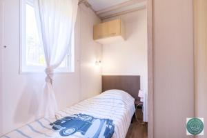 Chalet en Parc résidentiel pour 4 personnes à proximité de la plage