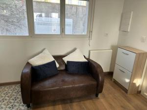 Appartements Petit Appart proche IMA : photos des chambres