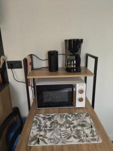 Maisons de vacances Au coin des Lilas - studio 2 : photos des chambres