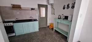 La casa, alquiler temporario - casa completa con cochera y patio- parrilla