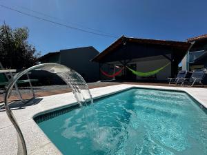 BS01- Casa com Piscina Aquecida e Churrasqueira