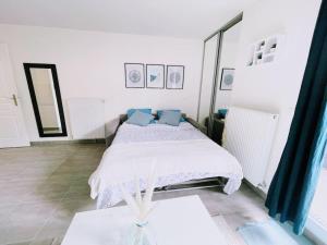 Appartements Cosy Studio Balcon Paris&Disney : photos des chambres