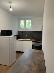 Appartements Appartement Chic & Elegant : photos des chambres