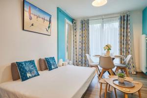 Appartements Appartement Bleu Turquoise - Welkeys : photos des chambres