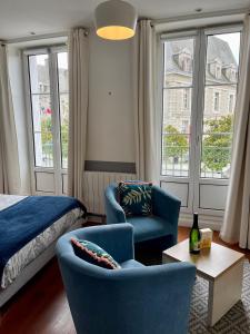 Appartements Le balcon de la place : photos des chambres