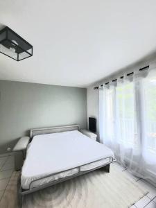 Appartements Joli appartement Proche Orleans : photos des chambres