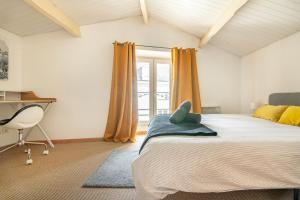 Appartements LE NID - HYPER CENTRE CHOLET - 25 MIN PUY DU FOU : photos des chambres