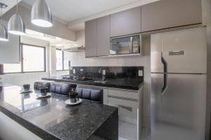 BK54 - Climatizado, TV Smart, Conforto, Garagem