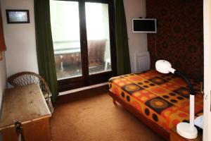 Appartements Residence Le Sunny Snow - COEUR DE STATION - Res. Sunny Snow - Appartement T3 8 personnes MAE-6561 : photos des chambres