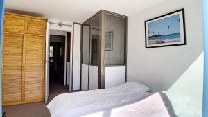 Résidence Caron - Appartement duplex lumineux · Départ et retour skis aux pieds · Balcon MAE-0004